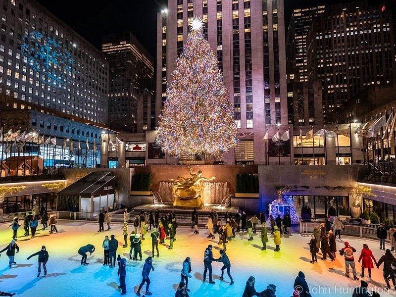 The Rockefeller Center Christmas tree above the skating rink, lit at night